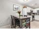 Kitchen with granite countertops and a built-in dining table at 3002 N 70Th St # 210, Scottsdale, AZ 85251