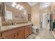 Guest bathroom with double vanity and granite countertop at 307 E Cheyenne Rd, San Tan Valley, AZ 85143