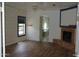 Open main bedroom with a fireplace and ensuite bathroom at 4119 E Glencove St, Mesa, AZ 85205