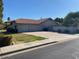 Spacious two-car garage with long driveway and well-kept lawn at 4119 E Glencove St, Mesa, AZ 85205