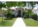Charming single-story home with desert landscaping and a covered entrance at 4119 E Glencove St, Mesa, AZ 85205