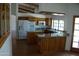 Spacious kitchen features stainless appliances, wood cabinets, and granite countertops at 4119 E Glencove St, Mesa, AZ 85205