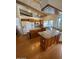Spacious kitchen with wooden cabinets, granite counters, and modern appliances at 4119 E Glencove St, Mesa, AZ 85205