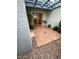 Paver patio, with gravel landscaping, and french doors that lead inside at 4119 E Glencove St, Mesa, AZ 85205