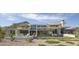 Stunning modern home with a luxurious pool and beautiful landscaping against a mountain backdrop at 4451 E Joshua Tree Ln, Paradise Valley, AZ 85253