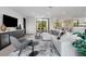 Bright living room with balcony and large windows at 4451 E Joshua Tree Ln, Paradise Valley, AZ 85253