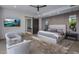 Relax in style in this main bedroom with comfortable seating and decor at 4451 E Joshua Tree Ln, Paradise Valley, AZ 85253