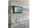 Smart home tablet displaying control features for multiple rooms at 4451 E Joshua Tree Ln, Paradise Valley, AZ 85253