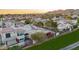 Large estate with manicured yard, patio, mature trees, and desert landscaping at 4636 E Monte Way, Phoenix, AZ 85044