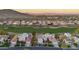 Stunning aerial view of the community with well-manicured landscaping and mountain views at 4636 E Monte Way, Phoenix, AZ 85044