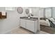 Bright bathroom featuring a double sink vanity, granite countertops, and a view into the bedroom at 48446 N Duran Way, Gold Canyon, AZ 85118