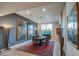 Dining room with large wooden table, stylish decor, and modern light fixture at 5674 N 12Th St, Phoenix, AZ 85014