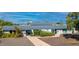Charming single-story home with a blue-grey tile roof, landscaped yard, and inviting front entryway at 5674 N 12Th St, Phoenix, AZ 85014