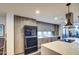 Beautiful kitchen with modern cabinets, stainless appliances, and island with seating at 5674 N 12Th St, Phoenix, AZ 85014