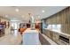 Spacious kitchen with island seating, stainless appliances, and modern lighting at 5674 N 12Th St, Phoenix, AZ 85014
