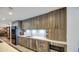 Modern kitchen with stainless appliances, sleek countertops, and wood-look cabinetry at 5674 N 12Th St, Phoenix, AZ 85014