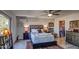 Beautiful main bedroom featuring a walk-in closet, stylish furniture, and contemporary lighting at 5674 N 12Th St, Phoenix, AZ 85014