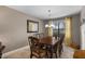 Formal dining room with wood table and chairs at 5859 E Elmwood E St, Mesa, AZ 85205