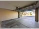 Two car garage with automatic door opener and view of the neighborhood out front at 6455 W Orchid Ln, Glendale, AZ 85302