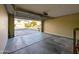 Two car garage with automatic door opener and view of the neighborhood out front at 6455 W Orchid Ln, Glendale, AZ 85302