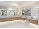 Modern bathroom with dual vanity and elegant light fixtures at 6516 E Meadowlark Ln, Paradise Valley, AZ 85253