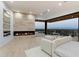 Main bedroom with a linear fireplace and amazing views at 6516 E Meadowlark Ln, Paradise Valley, AZ 85253