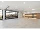 Large garage with glass door, offering natural light and a kitchenette at 6516 E Meadowlark Ln, Paradise Valley, AZ 85253