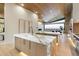 Modern kitchen features a large marble island and expansive views at 6516 E Meadowlark Ln, Paradise Valley, AZ 85253