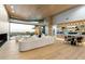Luxury living room with fireplace, large windows, and city views at 6516 E Meadowlark Ln, Paradise Valley, AZ 85253
