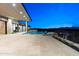 Expansive pool and spa with mountain views at dusk at 6516 E Meadowlark Ln, Paradise Valley, AZ 85253