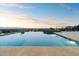 Infinity pool with stunning panoramic mountain views at 6516 E Meadowlark Ln, Paradise Valley, AZ 85253