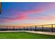 Rooftop terrace with artificial turf and city views at sunset at 6516 E Meadowlark Ln, Paradise Valley, AZ 85253