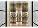 Custom-built wine cellar with ample storage for wine bottles at 6516 E Meadowlark Ln, Paradise Valley, AZ 85253