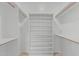 Neat walk-in closet with shelving and hanging storage at 7735 E Russell Cir, Mesa, AZ 85207