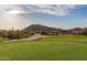 This scenic golf course boasts lush green fairways and stunning mountain views, perfect for an afternoon round at 7735 E Russell Cir, Mesa, AZ 85207