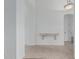 Bright hallway with arched entry and decorative console table at 7735 E Russell Cir, Mesa, AZ 85207
