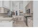 Kitchen area with stainless steel appliances, ceramic backsplash, and light cabinetry at 7735 E Russell Cir, Mesa, AZ 85207