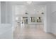Spacious living room with tile floors and seamless access to the outdoors at 7735 E Russell Cir, Mesa, AZ 85207