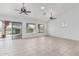 Bright and spacious living area with access to an outdoor patio at 7735 E Russell Cir, Mesa, AZ 85207
