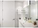 Clean bathroom with a white vanity, mirror, and modern fixtures at 7915 E Primrose Path, Carefree, AZ 85377