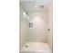 Walk-in shower with glass enclosure and light beige tile at 7915 E Primrose Path, Carefree, AZ 85377