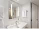 Clean bathroom with modern sink and illuminated mirror at 7915 E Primrose Path, Carefree, AZ 85377