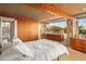 Mid-century bedroom with wood details and mountain views at 7915 E Primrose Path, Carefree, AZ 85377