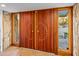 Mid-century modern entry with unique wood doors at 7915 E Primrose Path, Carefree, AZ 85377