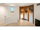Modern hallway with curved walls and wood accents at 7915 E Primrose Path, Carefree, AZ 85377