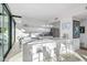 Modern white kitchen with island and mountain views at 7915 E Primrose Path, Carefree, AZ 85377