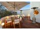 Deck with dining area and patio heaters at 7915 E Primrose Path, Carefree, AZ 85377