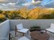 Desert landscape view from a modern patio with seating at 7915 E Primrose Path, Carefree, AZ 85377