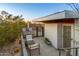 Relaxing patio with seating area and pool access at 7915 E Primrose Path, Carefree, AZ 85377