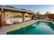 Luxury pool and patio with lounge chairs at 7915 E Primrose Path, Carefree, AZ 85377